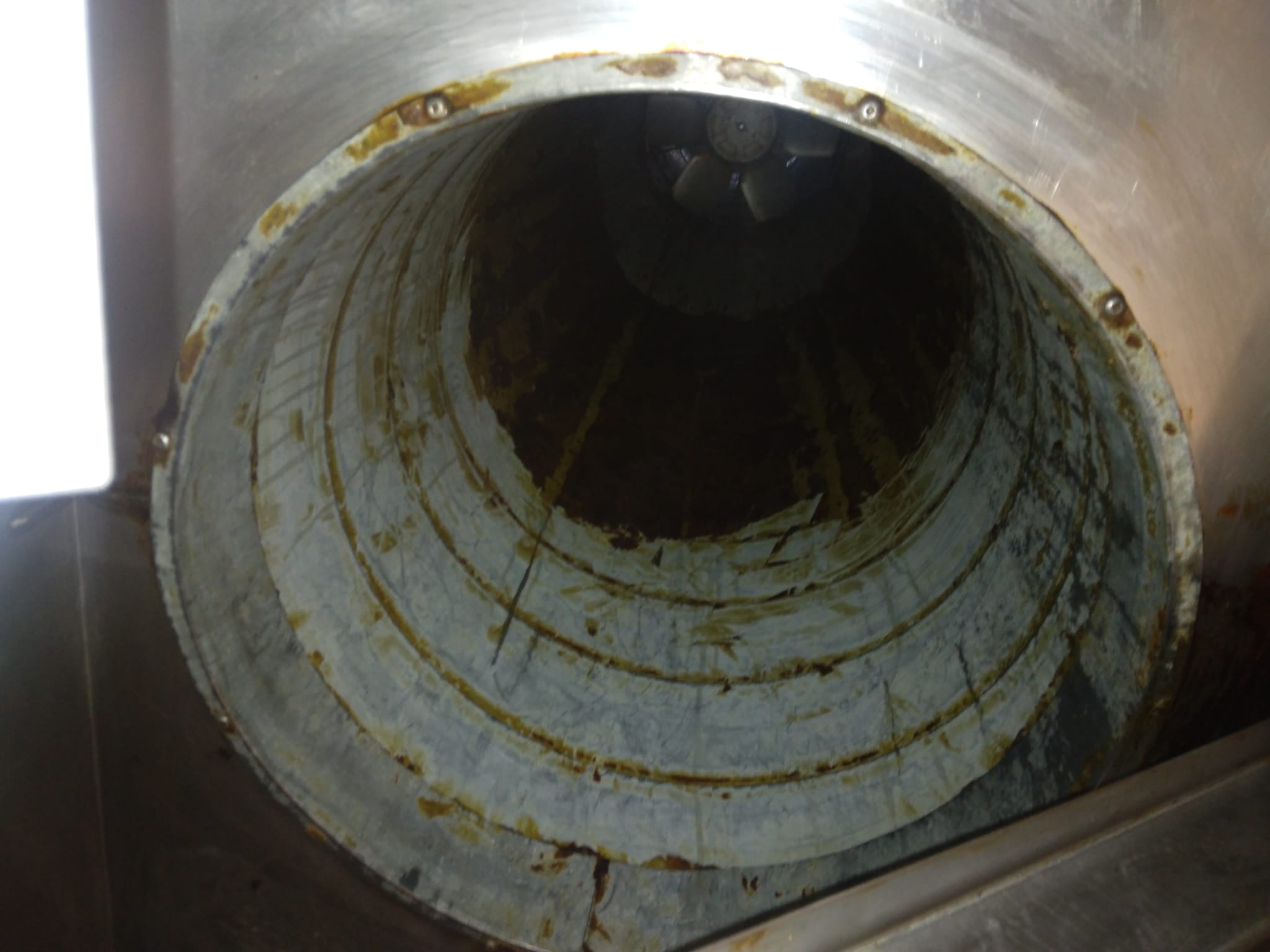 Grease extraction of a kitchen air duct