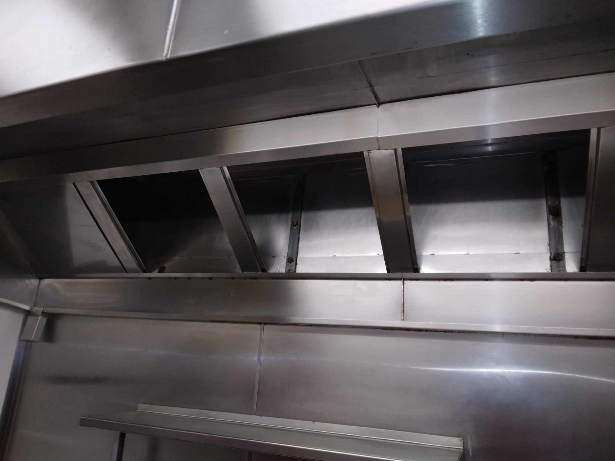 Kitchen with extract fan covers removed for cleaning