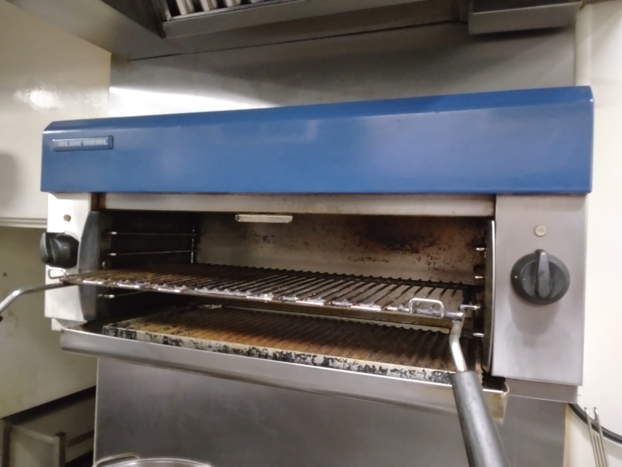 Dirty industrial oven before a deep clean